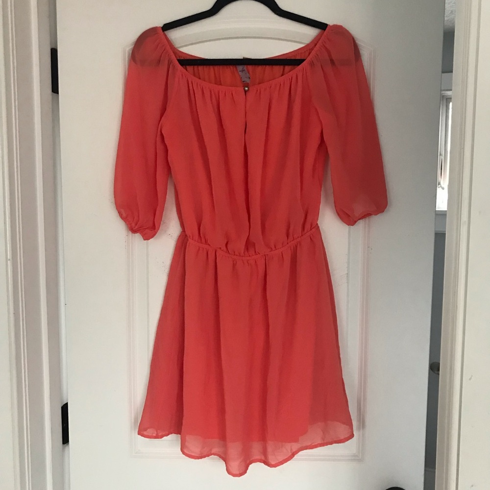Orange cinched sleeves and waist